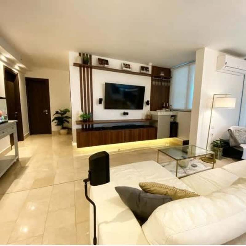 Living room with sectional sofa, TV wall, open design PH Vita Coco del Mar