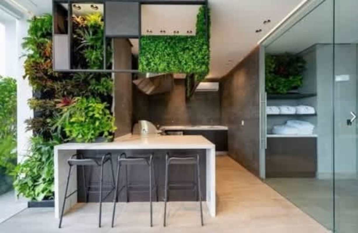 Biophilic design kitchen with vertical garden PH Vita apartment Coco del Mar
