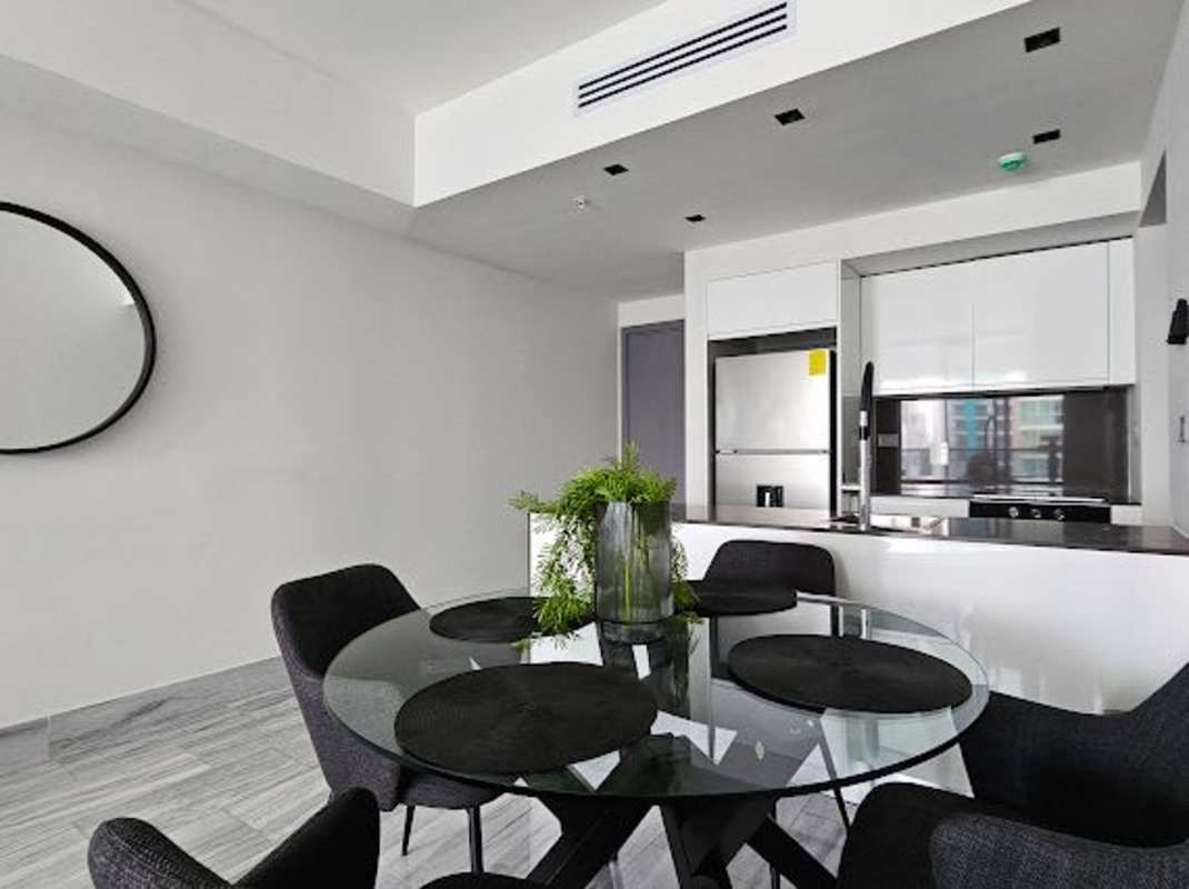 Open dining and living area with modern furniture ocean views PH BICSA Panama City