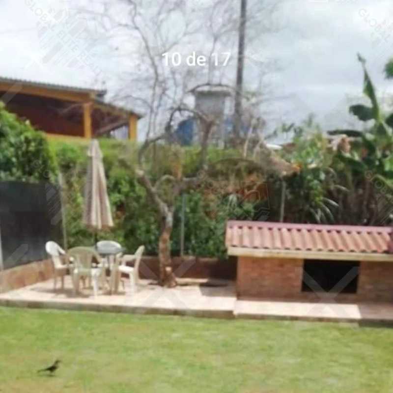 Garden yard with patio seating lawn and mature trees at Praderas San Antonio