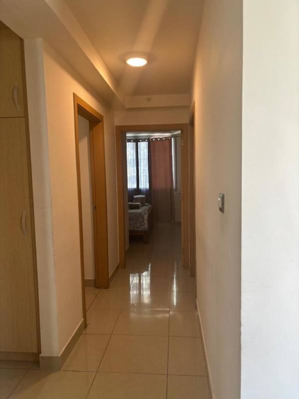 Furnished bedroom featuring AC unit and closet in PH Rokas Condado del Rey Panama City