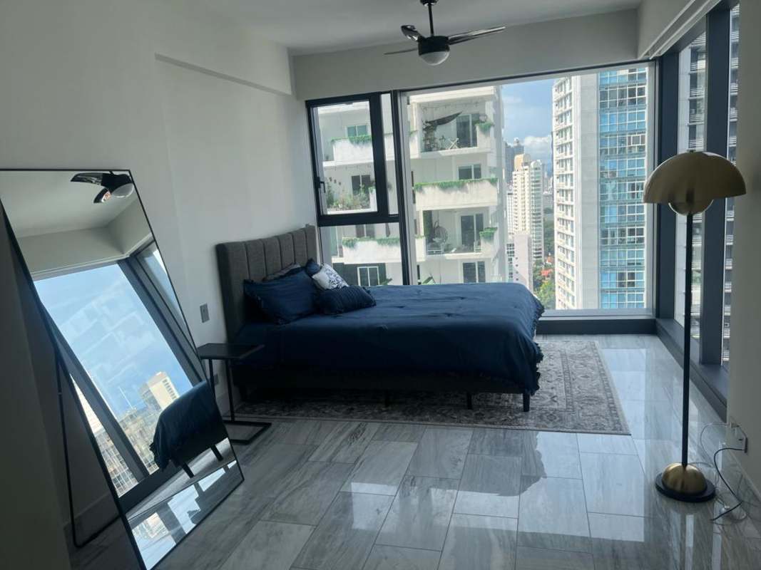 Private balcony overlooking Pacific Ocean and Avenida Balboa skyline at Nuovo by Armani Panama
