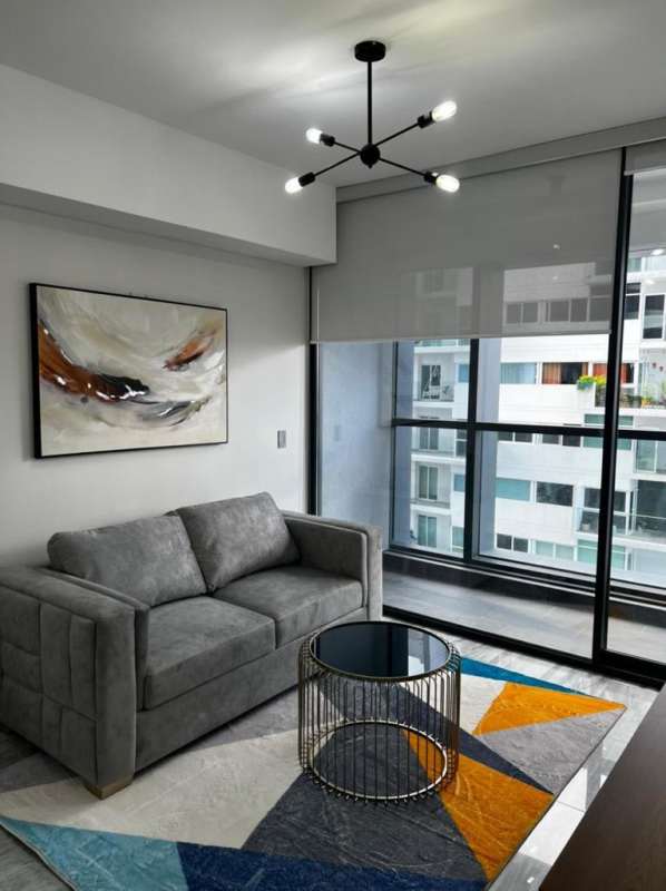 Contemporary kitchen with built-in appliances and quartz countertops in Nuovo by Armani Casa