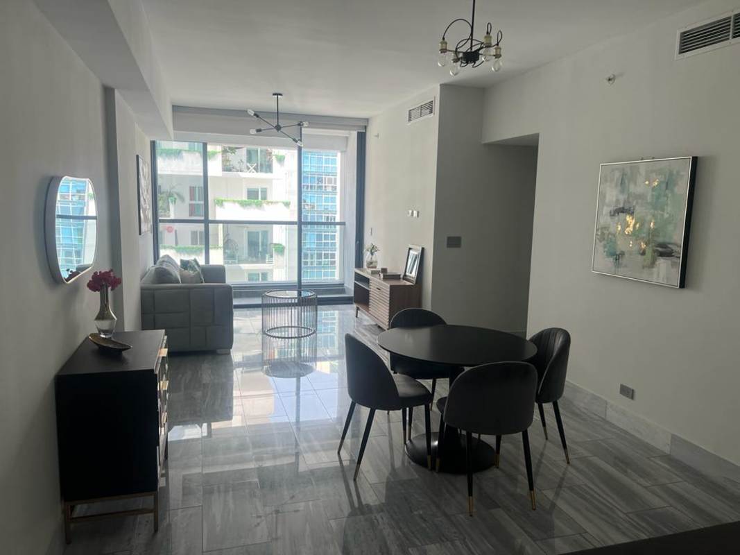 Master bedroom with floor-to-ceiling windows and Pacific Ocean views in Nuovo by Armani Panama