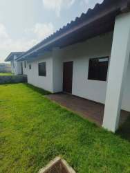 Empty living room with tiled floors and windows new house Cerro Silvestre Arraiján