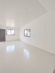 Minimalist brightly lit living space new house Cerro Silvestre Arraiján Panama