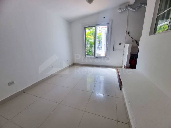 Master bedroom with wood floors, large windows, balcony PH Obarrio Residences Panama