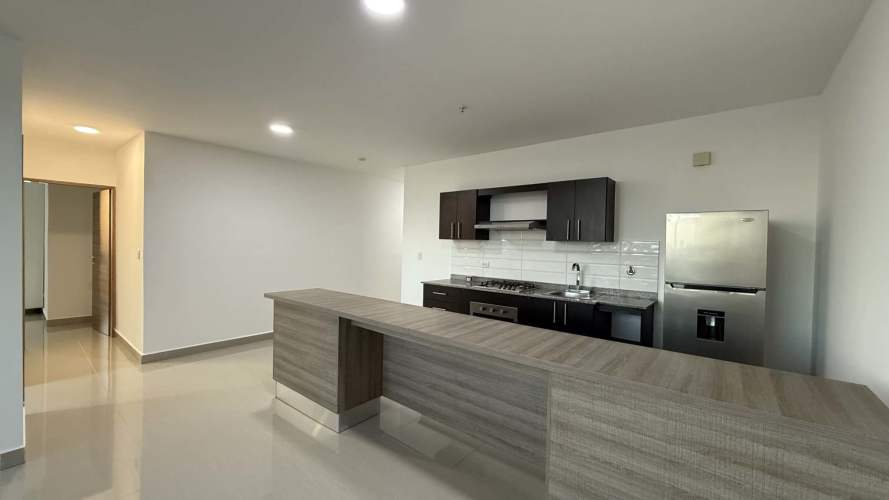 Bedroom with large window in PH El Carmen Tower featuring stunning city skyline views