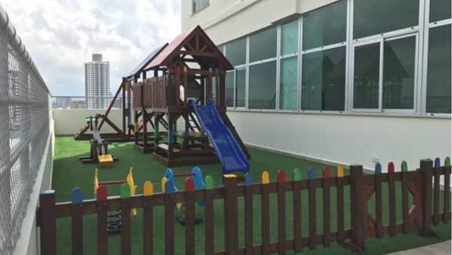 Kids’ outdoor play area on terrace with city view at PH El Carmen Tower Panama City