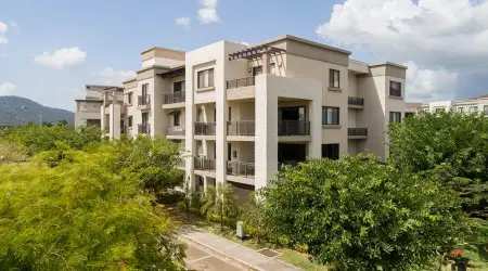 Open kitchen with appliances in PH Mosaic Panama Pacifico apartment rental