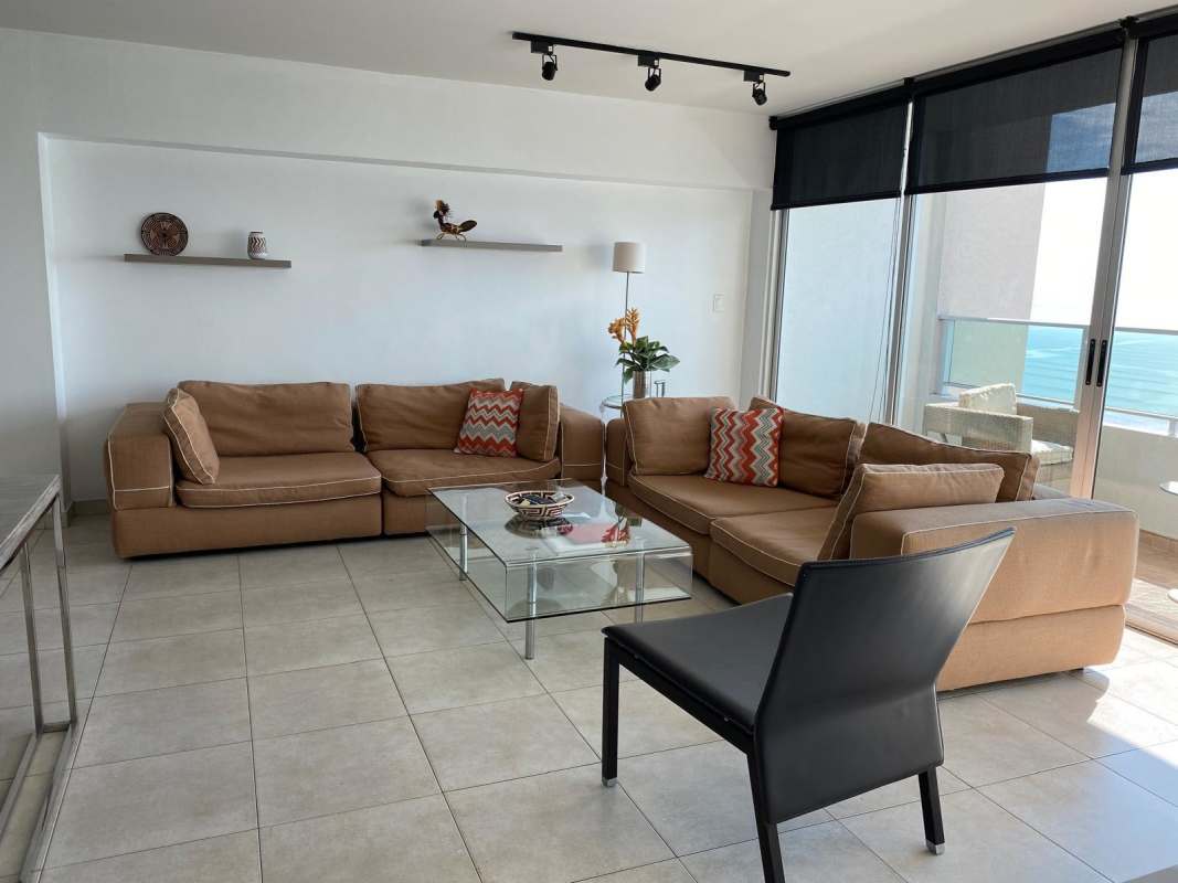 Bright master bedroom with large window and ocean views Punta Pacifica Panama