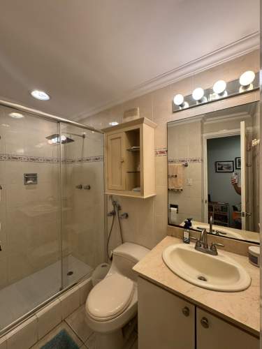 Modern bathroom granite top vanity glass shower PH Miyaki apartment Obarrio Panama