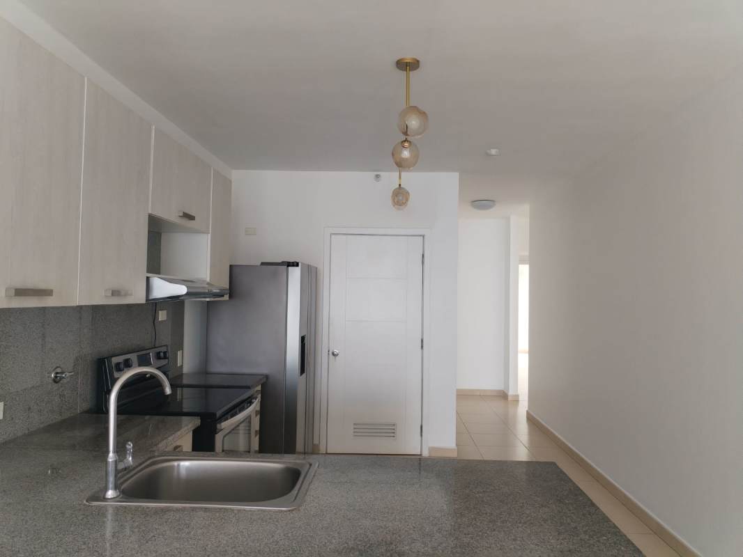 Dining area with panoramic views and balcony access at BICSA Tower apartment Panama City