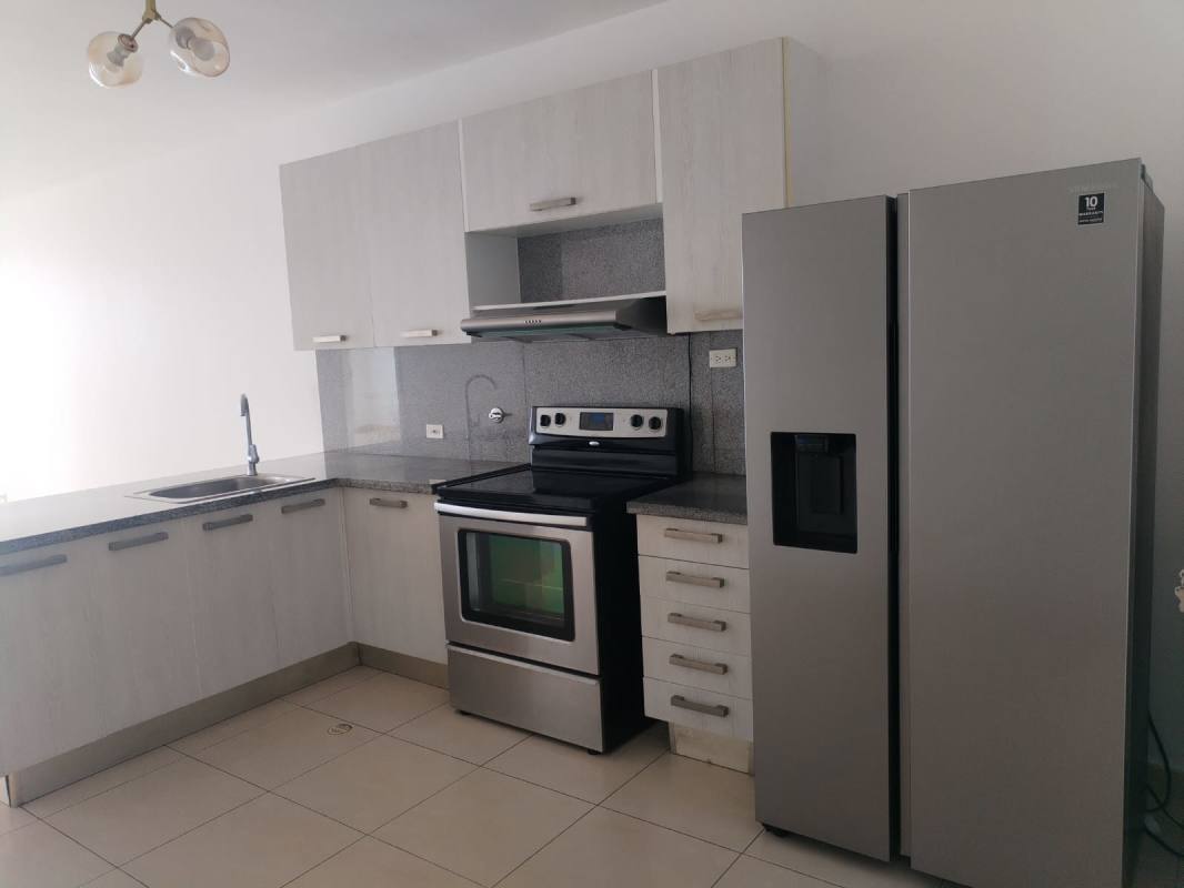 Contemporary bathroom with glass shower and modern vanity in BICSA Tower Panama City