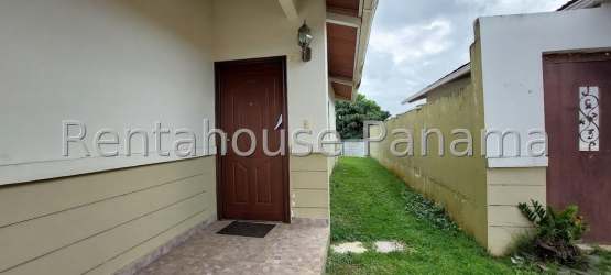 Covered two car parking and tiled porch in gated community house La Chorrera