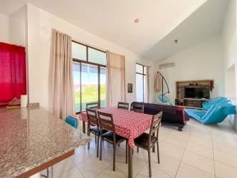 Outdoor swimming pool with bohío and garden Piedras Gordas Village San Carlos Panama