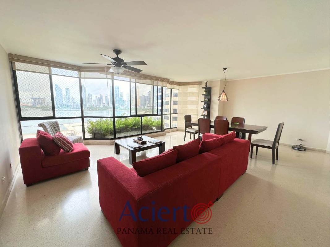 Modern bathroom featuring glass walk-in shower in remodeled PH Punta Paitilla condo.