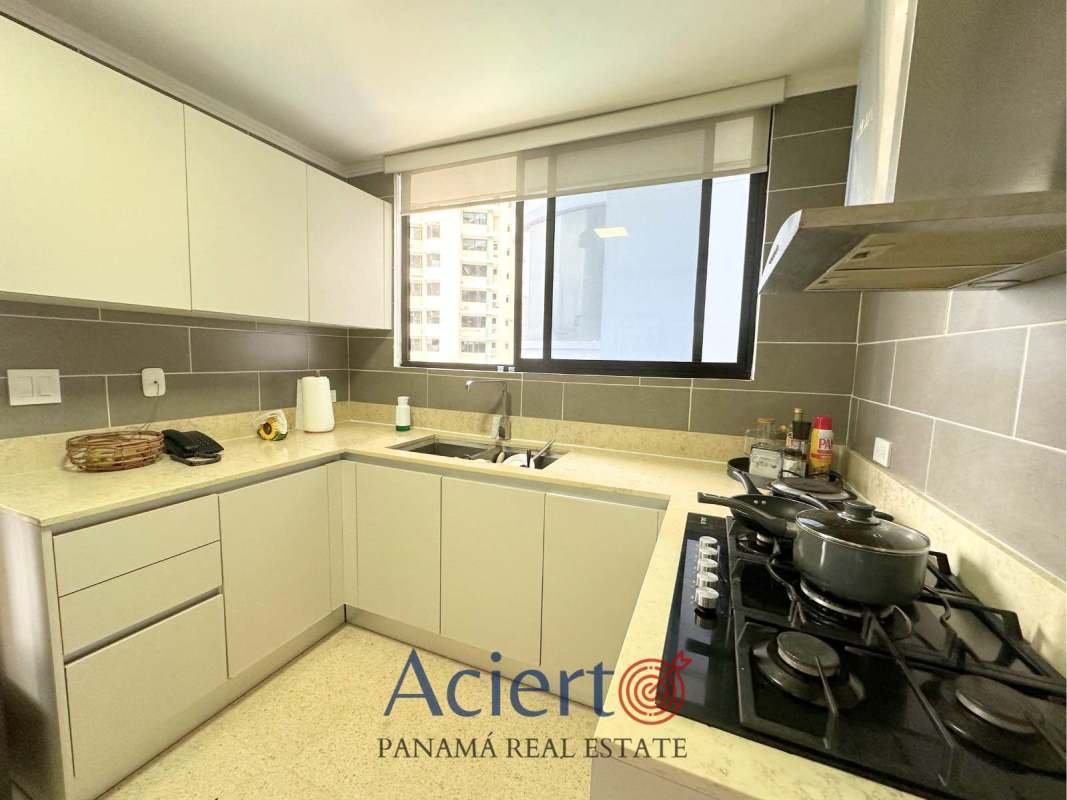 Large master bedroom with ocean views and walk-in closet in PH Punta Paitilla Panama.