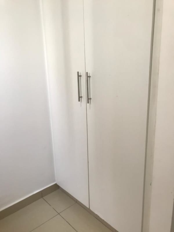 Contemporary kitchen with granite tops, wood cabinets and laundry PH San Francisco Bay