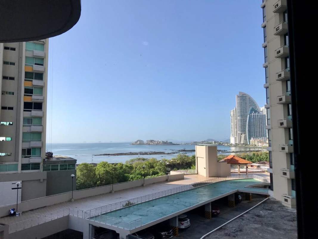 Open plan modern living dining with large windows PH San Francisco Bay Panama