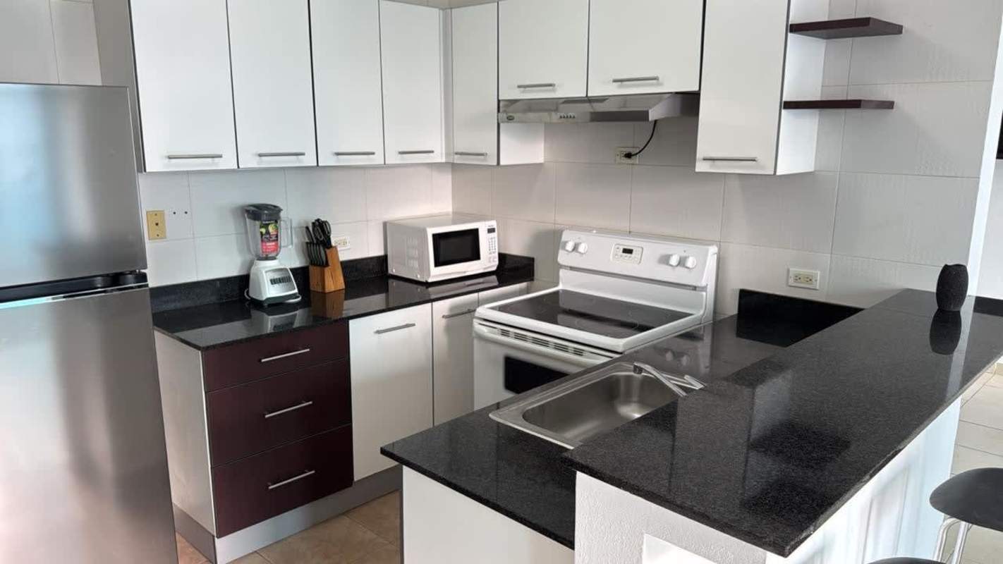 Open plan living dining with panoramic ocean views at Bayfront Tower Panama