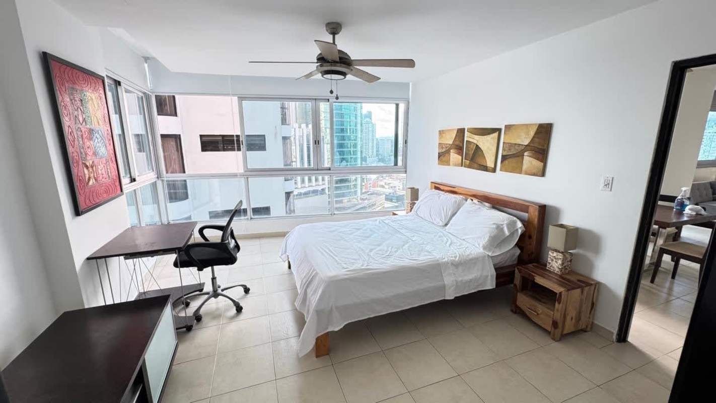 Fully equipped granite kitchen in furnished Avenida Balboa apartment Panama