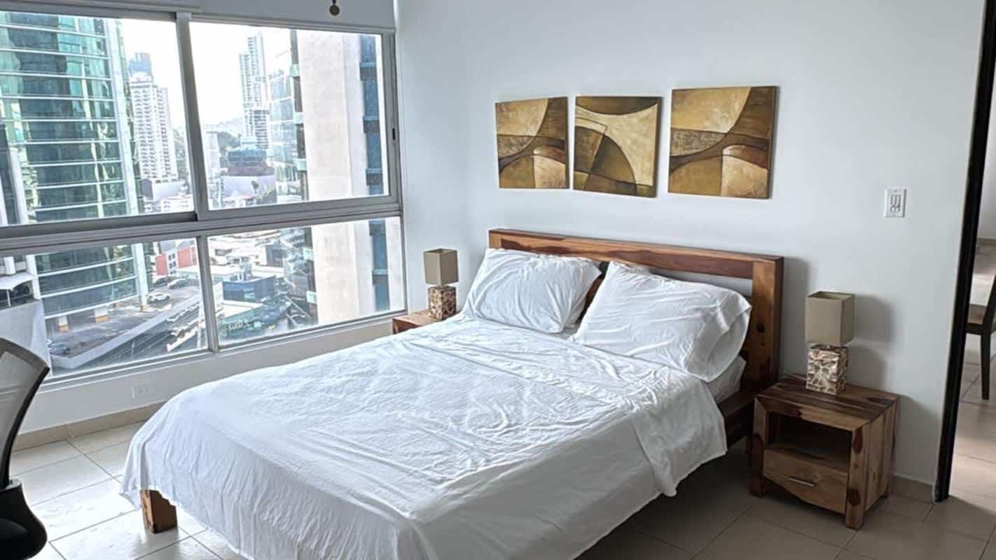 Bright ensuite bedroom with large window ocean view PH Bayfront Panama City