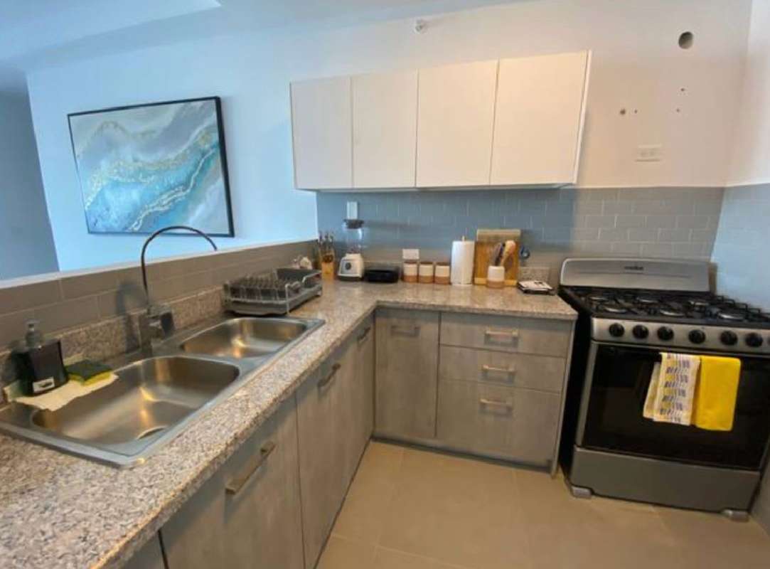 Fully equipped modern kitchen with granite countertops PH La Cresta Bella Vista Panama City