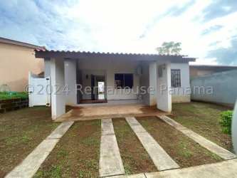 Living room with large sliding glass doors, ceramic tile floors, curtains and AC Los Pinos La Chorrera