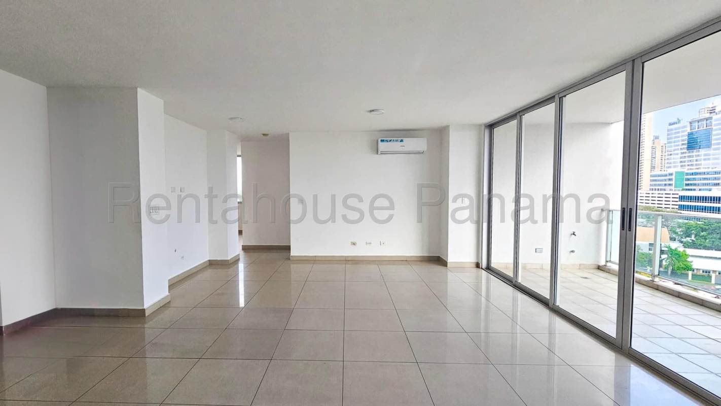 Modern kitchen with granite countertops, gas stove, wooden cabinets in PH Sevilla Costa del Este Panama