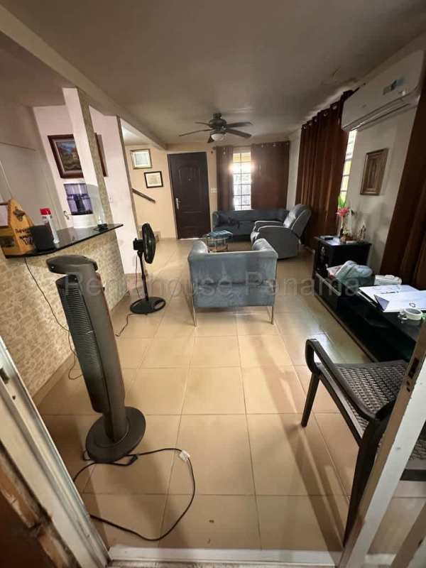 Spacious living room with ceiling fan and tiled floor in Villa Eva Las Cumbres