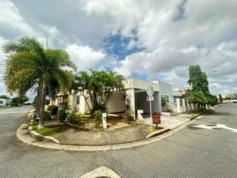 Modern single story house corner lot with palm trees garden in Residencial Las Arboledas La Chorrera Panama