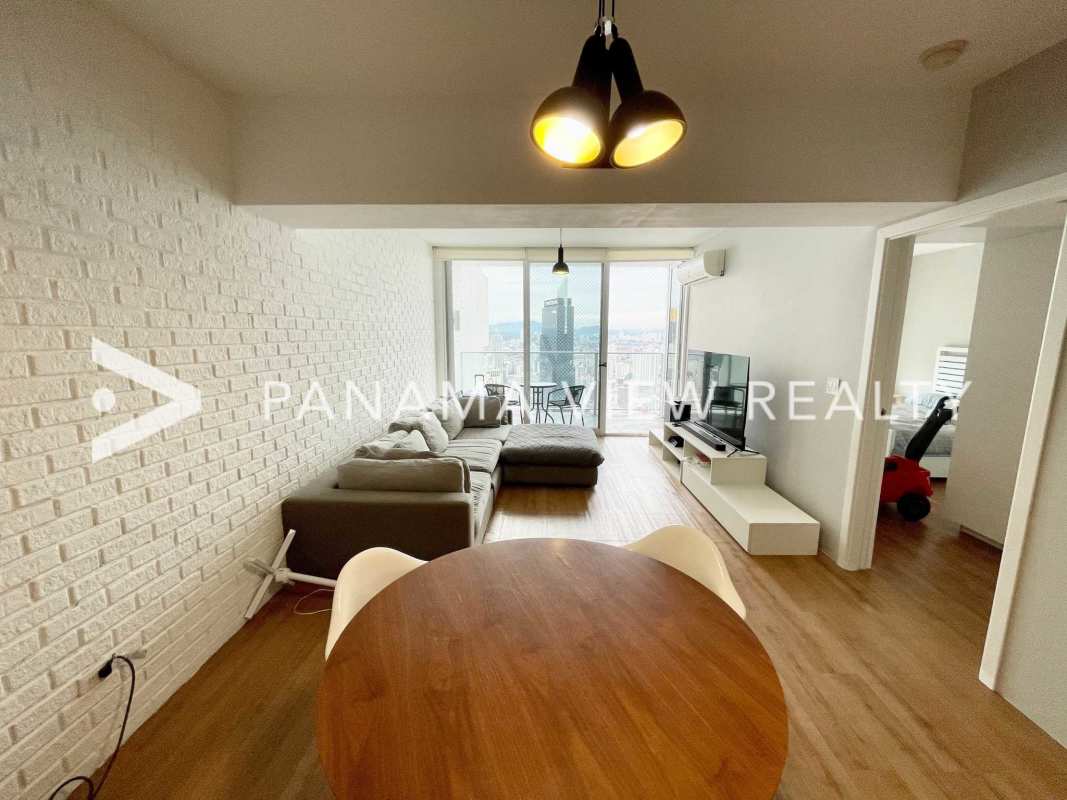 Spacious living room with ocean views floor-to-ceiling windows marble floors in PH Waters on the Bay Panama