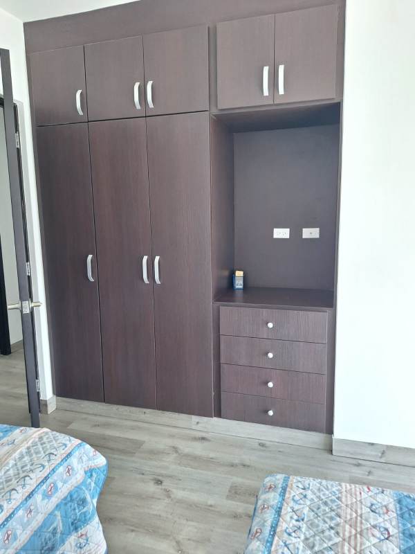 Modern kitchen with granite countertops and breakfast bar in PH Waterfalls Panama