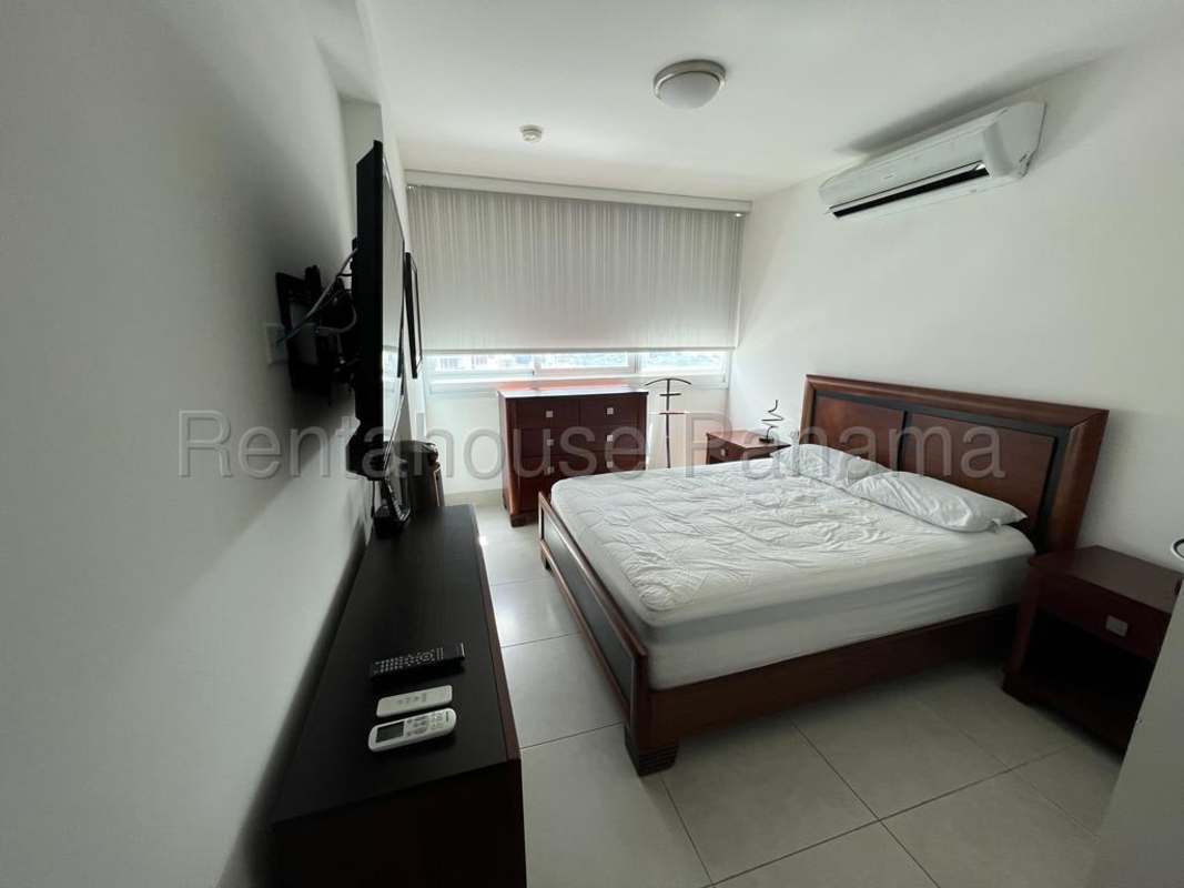 Contemporary bathroom with glass shower enclosure and large mirror Edison Park Panama