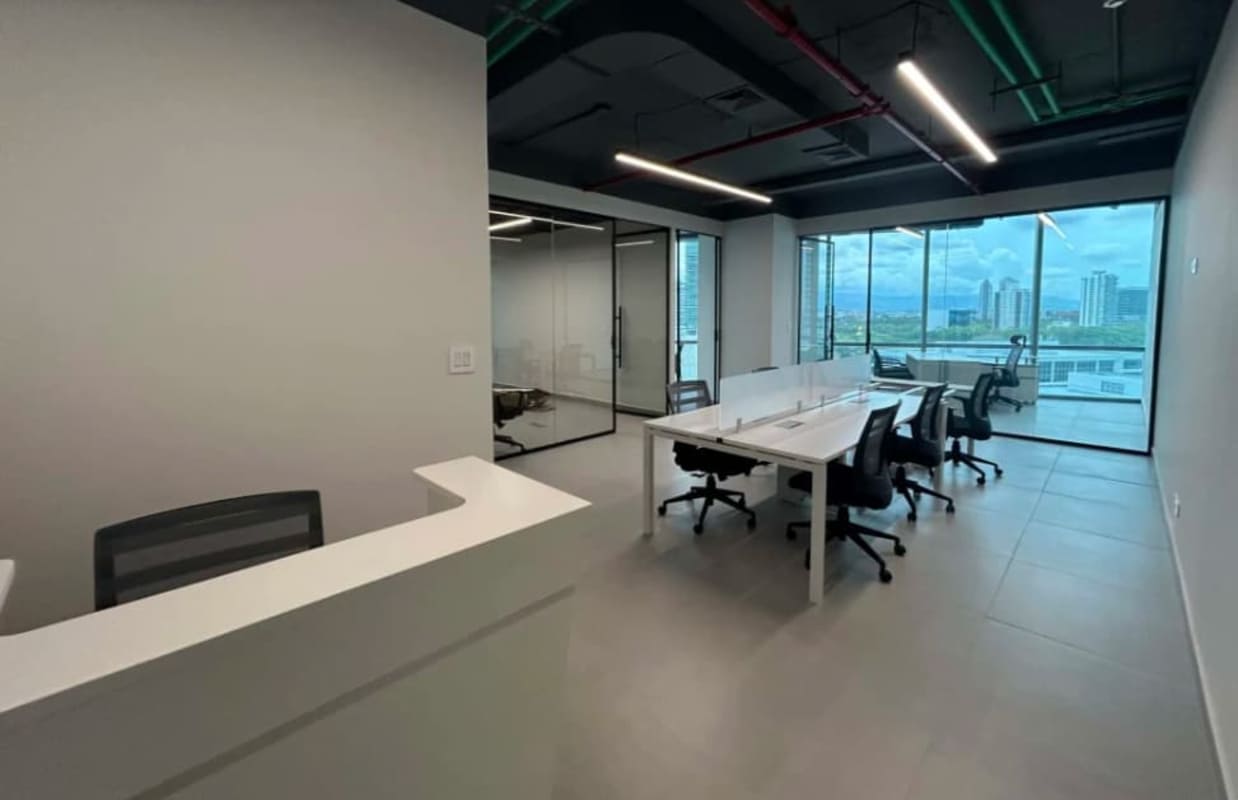 Reception area with seating in furnished office at Financial Park Costa del Este