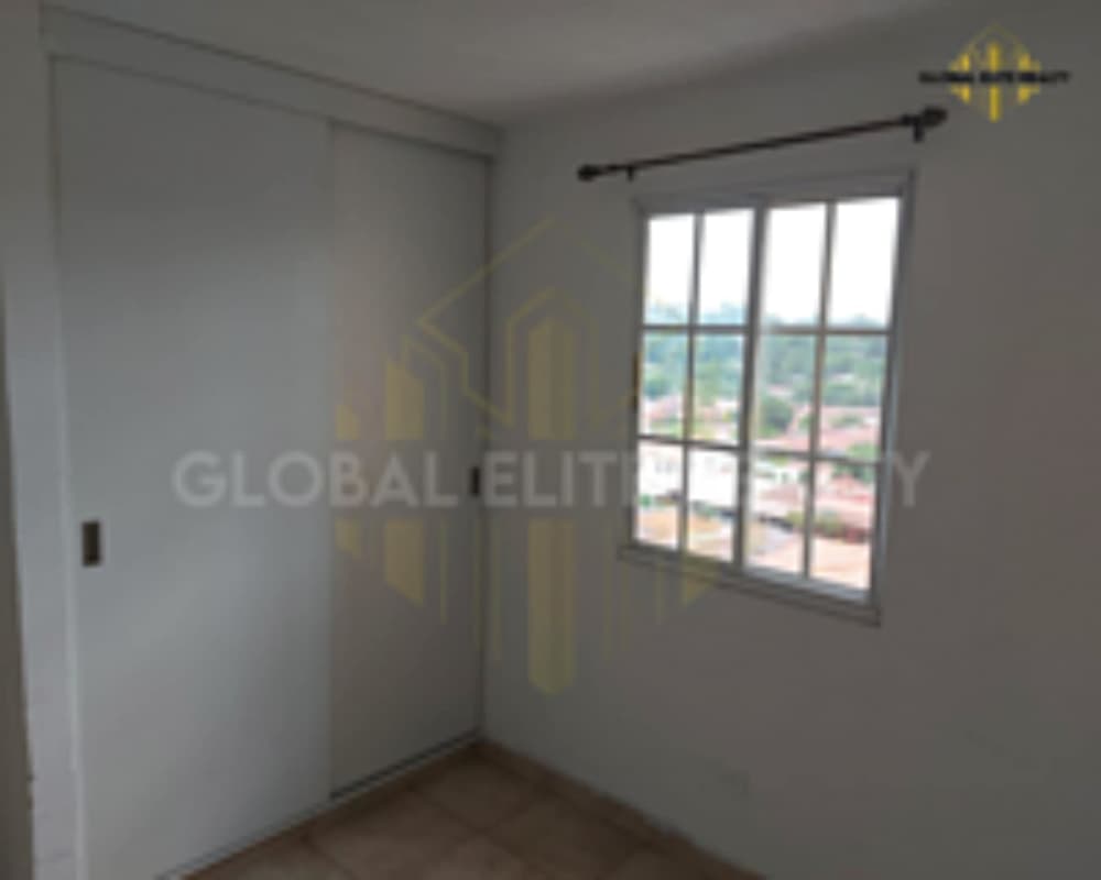 Kitchen with ceramic backsplash, cabinetry, double sink in Villa Lucre apartment Panama