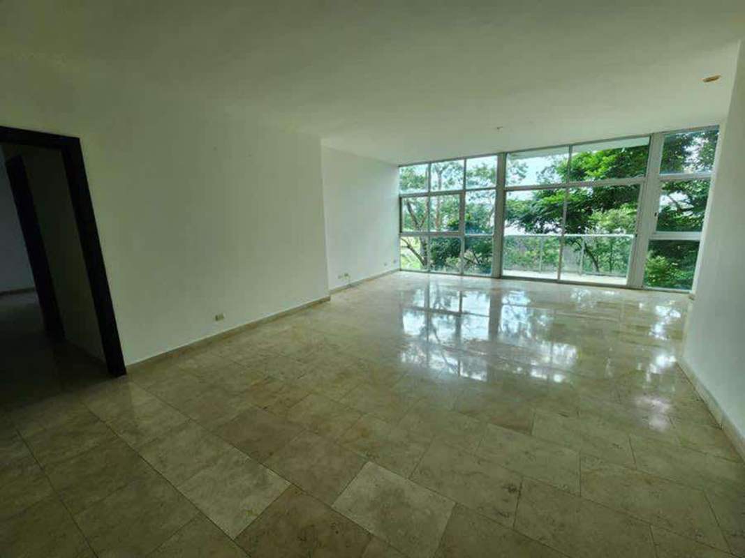 Sunroom with floor-to-ceiling windows and views to greenery PH The Bridge Ancón Panama
