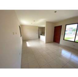 Open living space with tiled floors, large window in Piamonte David house rental