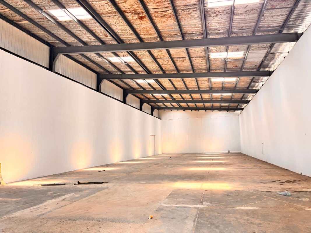Spacious empty warehouse interior with high ceiling and concrete floor in Juan Díaz Panama