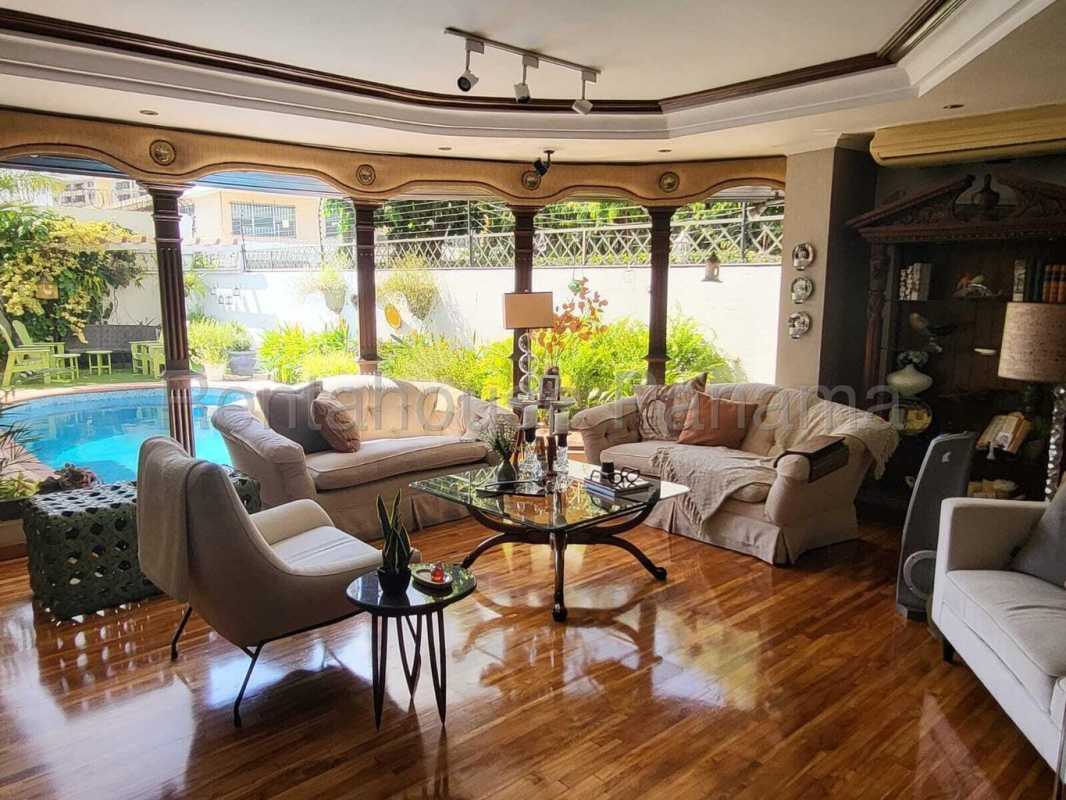 Elegant dining area with lounge space wooden floors upscale house for sale Panama City