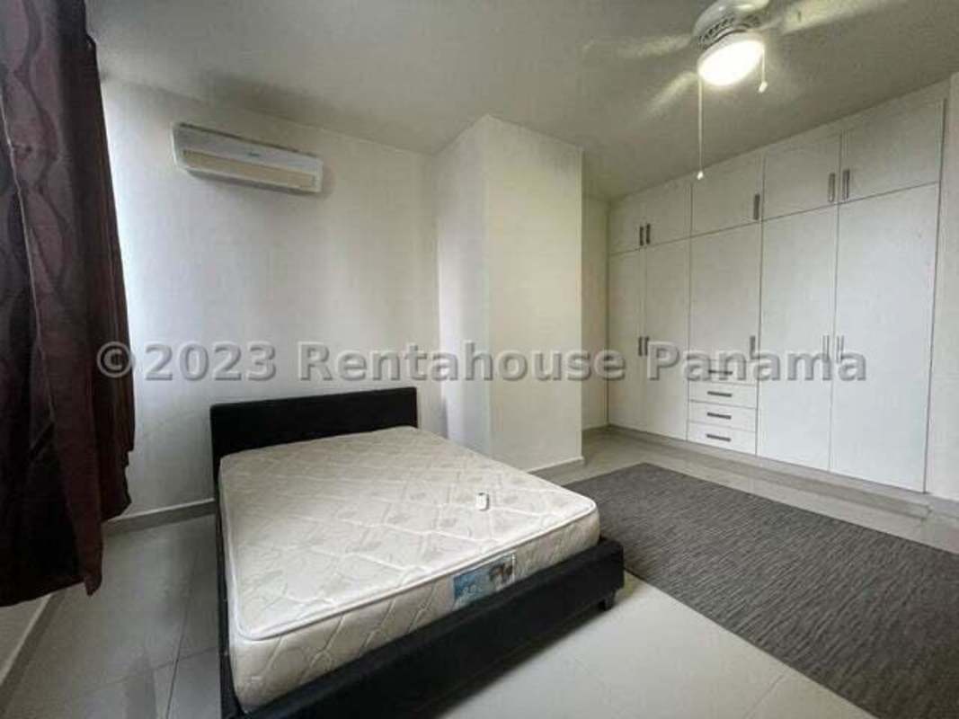 Kitchen with granite countertops, modern cabinetry and appliances in PH San Francisco Bay Panama City