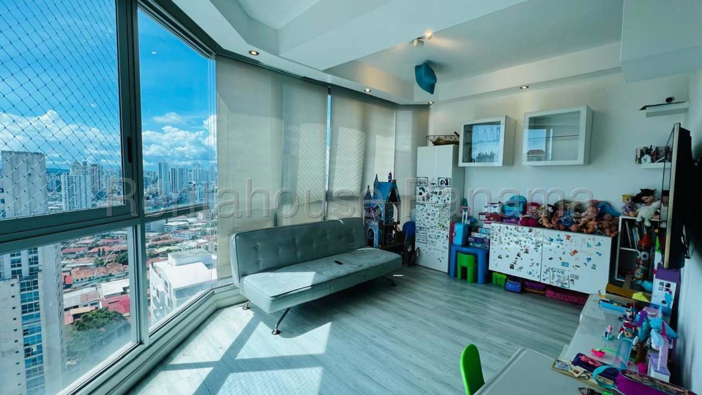 Modern bathroom with glass shower enclosure and granite vanity for sale in luxury Panama apartment Coco del Mar