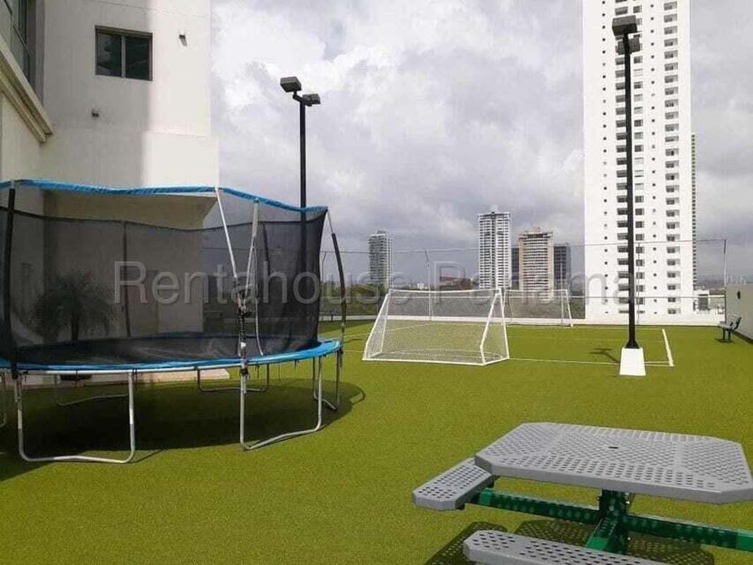 Children's rooftop playground with slides, monkey bars and skyline view PH Paramount Panama