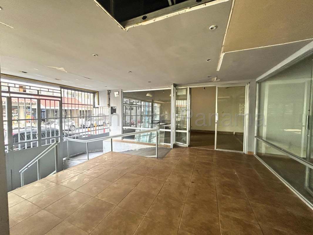 Vacant interior of commercial rental in El Cangrejo with tiled floors and wide windows