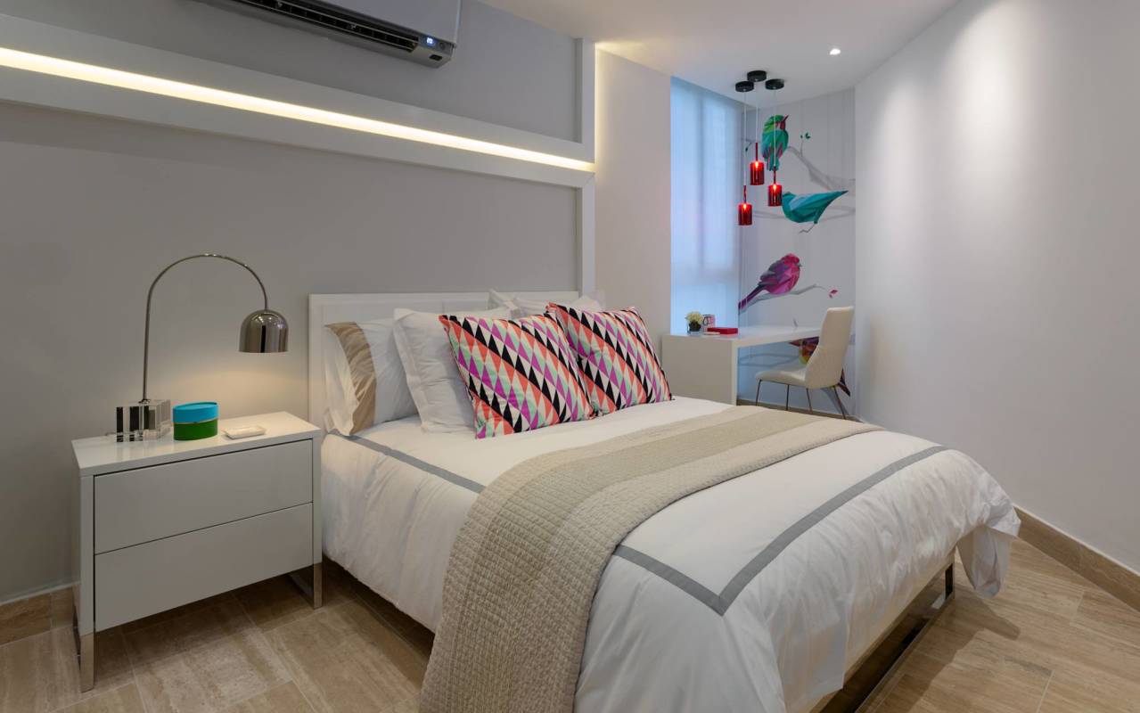 Elegant bathroom with glass-enclosed shower, modern vanity and marble floors PH Grand Tower Costa del Este