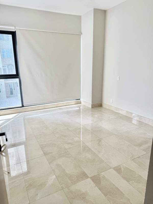 Gourmet kitchen with stone countertops, large island and premium appliances in PH Mansion One Santa María Panama City