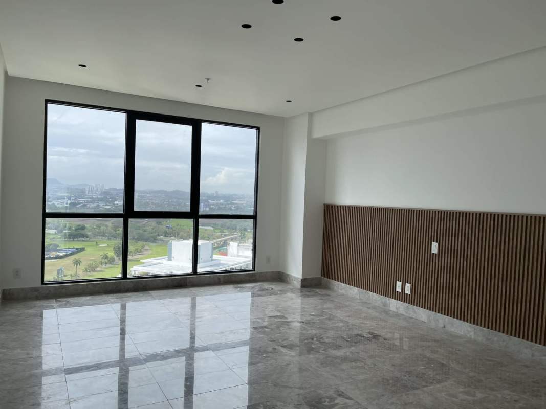 Luxury minimalist kitchen with large island, stainless appliances in Panama Santa María