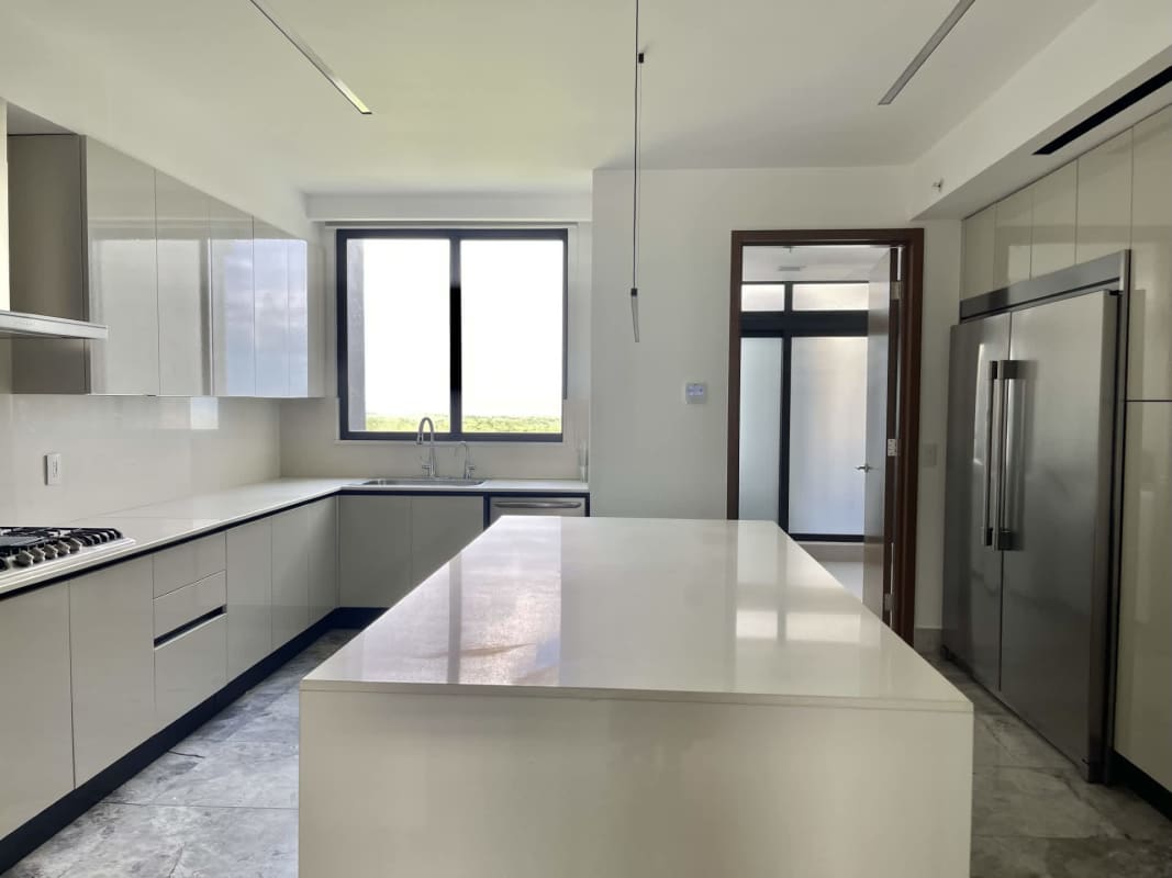 Luxury empty bedroom with large windows, marble floors in PH Ocean House Santa María Panama