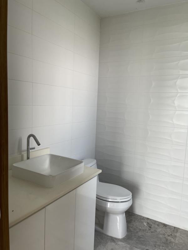 Contemporary minimalist bathroom with marble tiles and vessel sink PH Oceana Santa María Panama